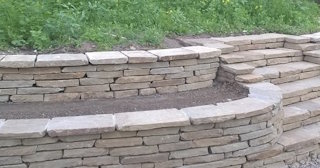 Установка подпорной стенки из камня в Ленинске-Кузнецком - стоимость от 3577 руб.
